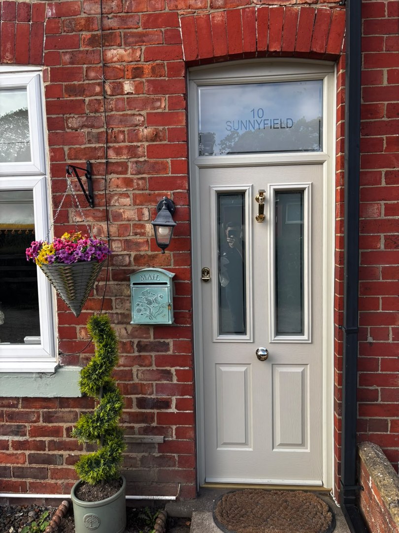 Agate grey composite door with gold knocker, great ayton by endeavour windows
