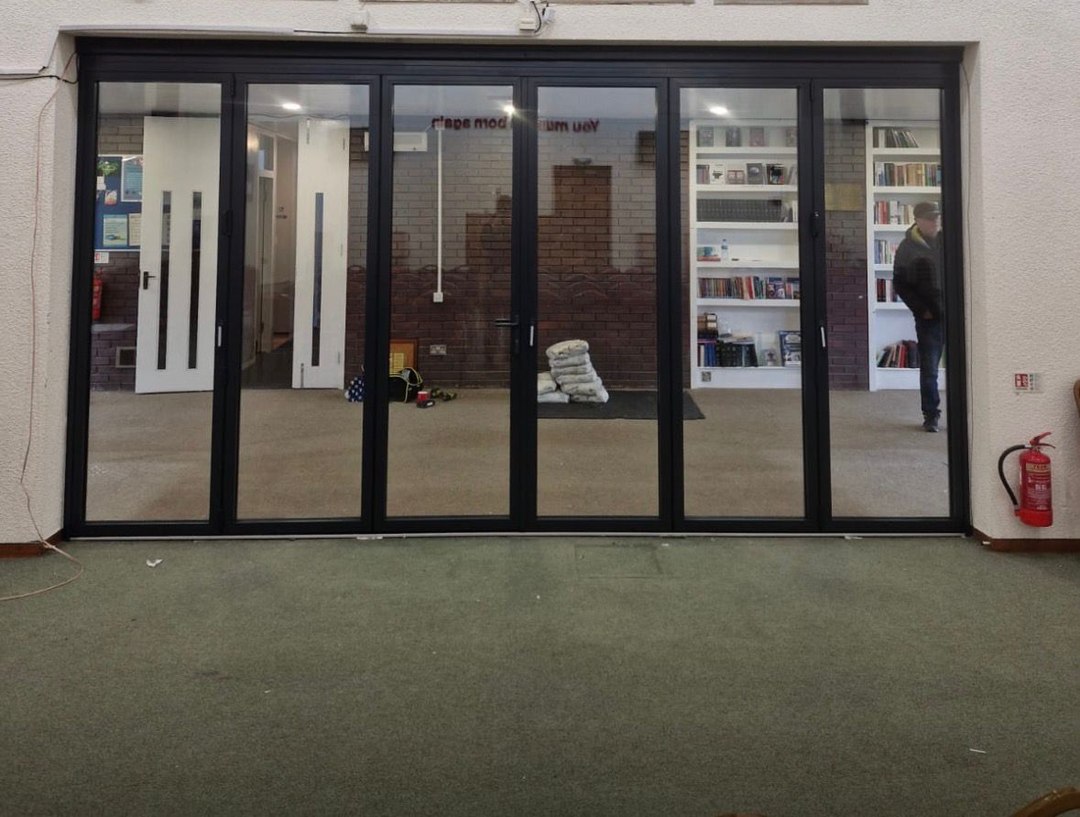 Church conversion — anthracite grey aluminium bifolds, middlesbrough by endeavour windows