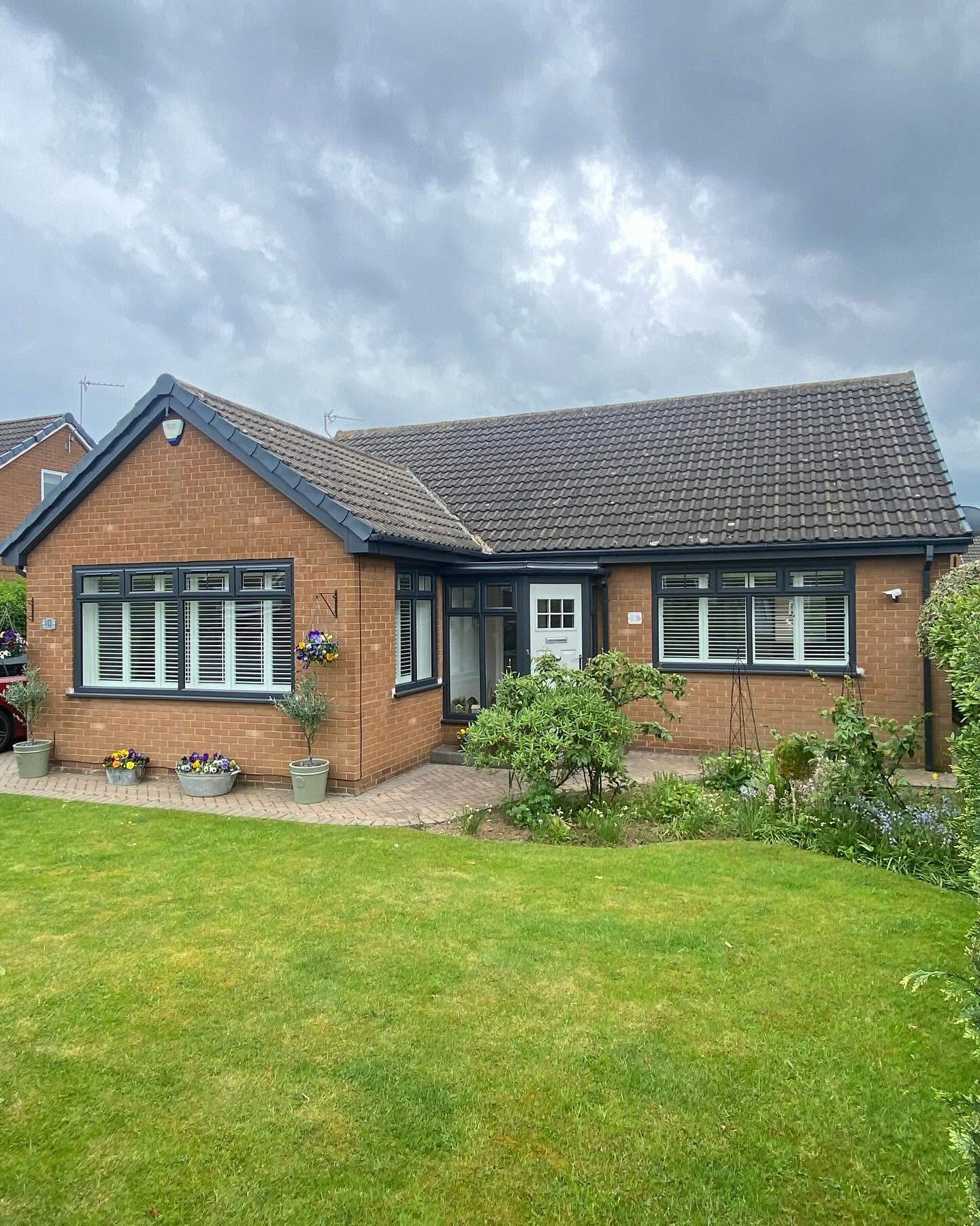 Anthracite grey fascias, soffits and guttering fitted to a brick bungalow in teesside