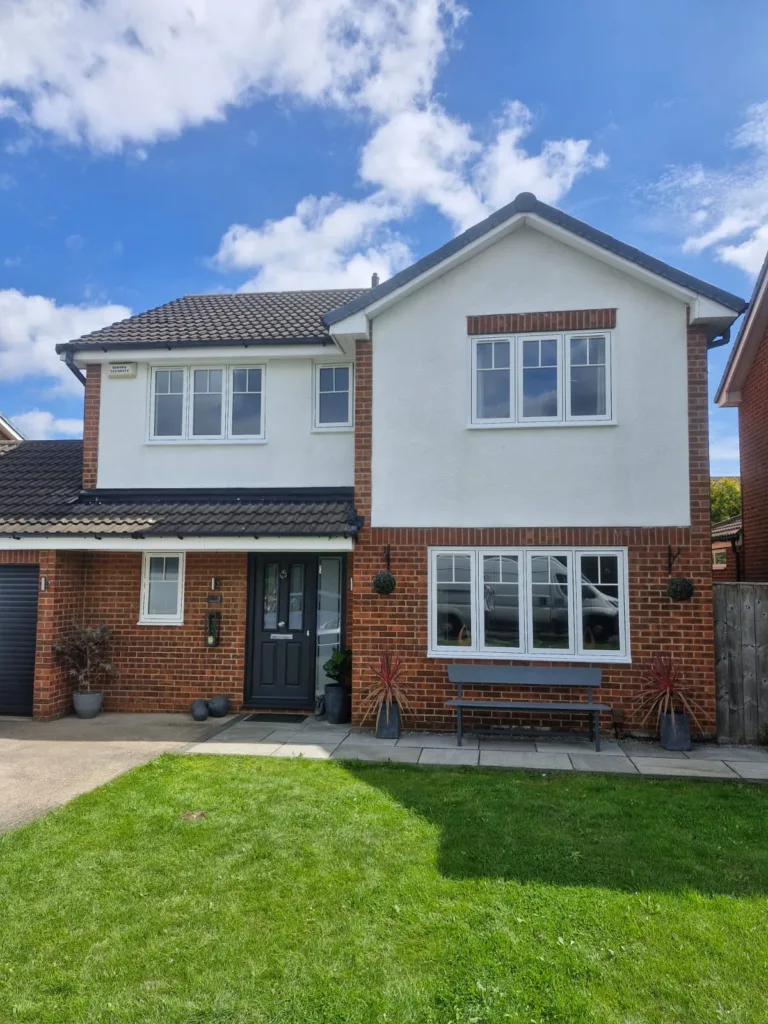 Full house of white flush casement windows with astragal bars installed in yarm installed in yarm