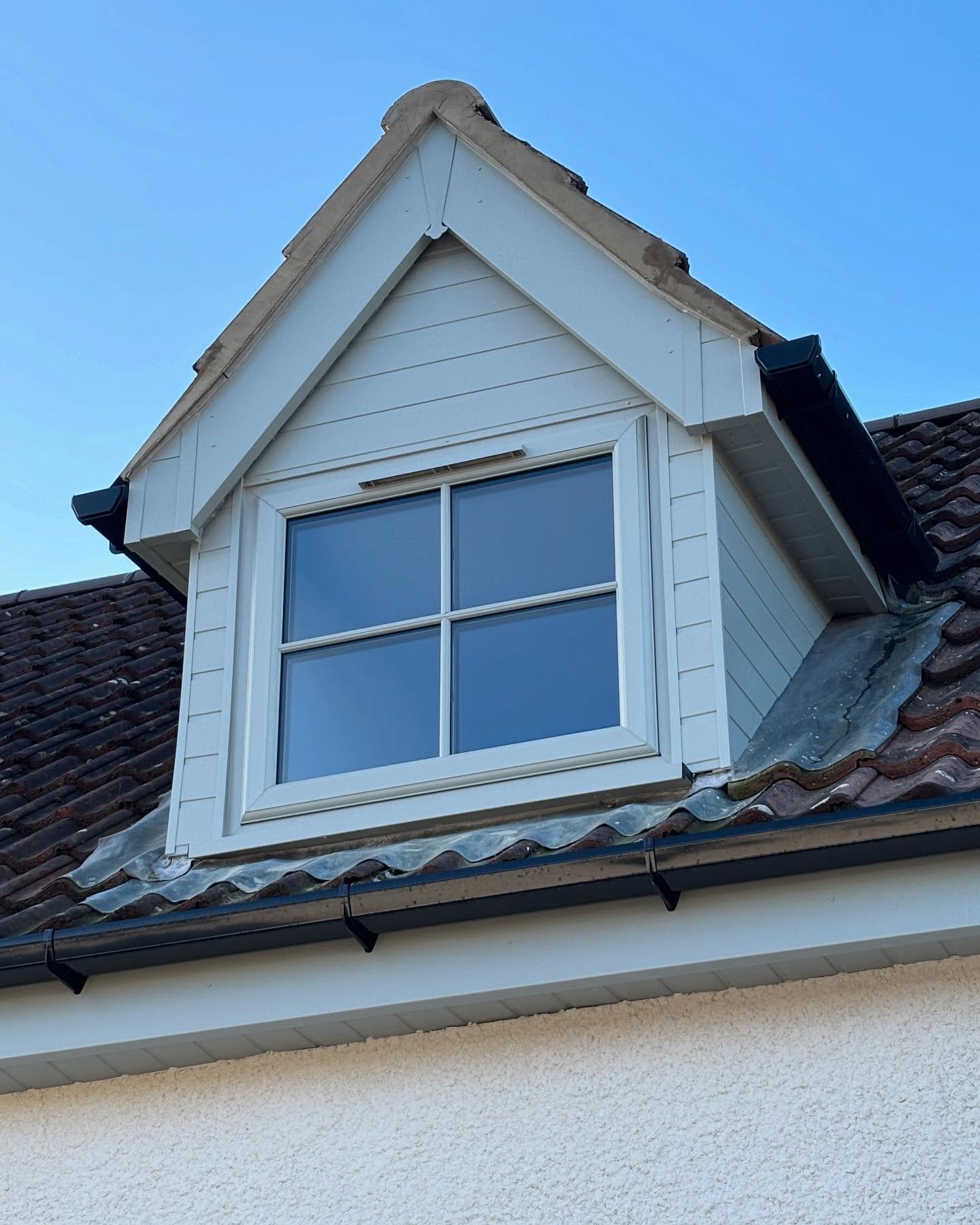 White fascias and soffits finishing a dormer window